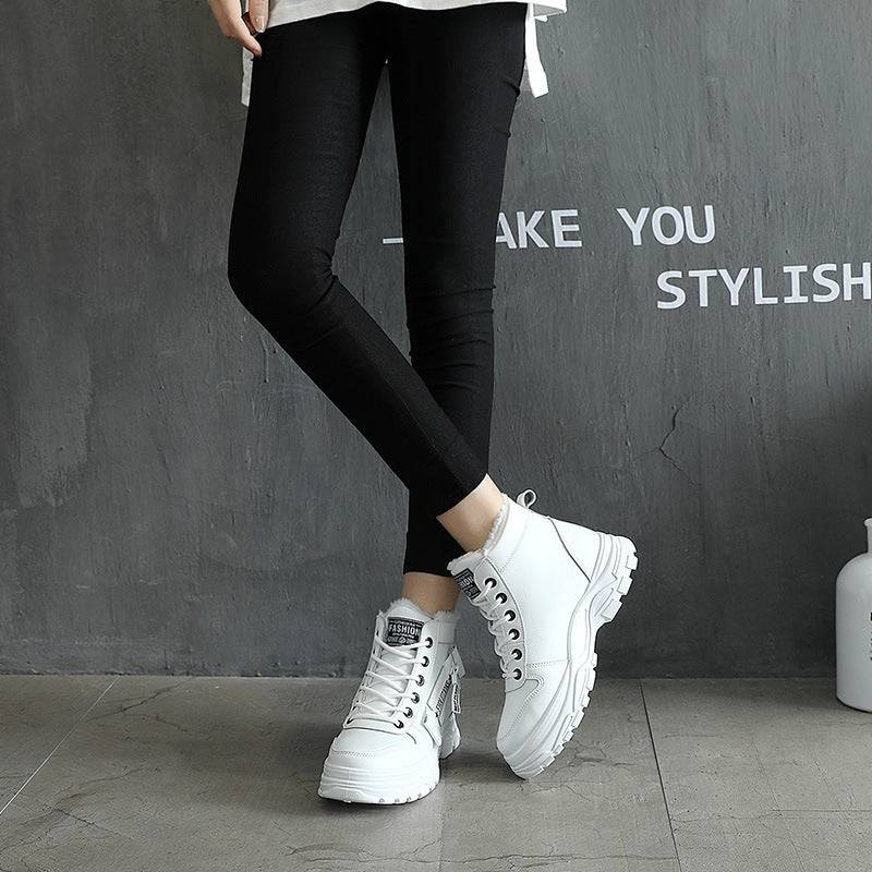 Model wearing white Korean High-top Martin Boots with black pants, highlighting trendy and versatile student footwear.