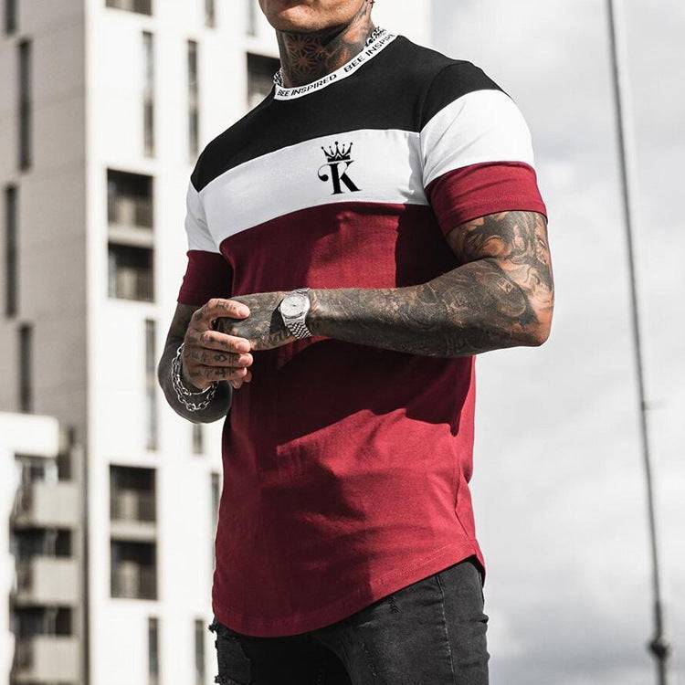 Color block casual round neck t-shirt in red, white, and black with short sleeves and digital printed chest logo for streetwear style.