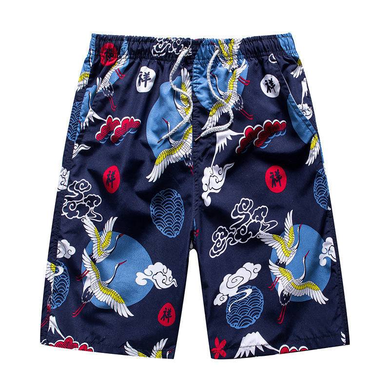 Navy men's beach shorts with crane and cloud prints, inspired by traditional Asian art for a stylish beachwear option.