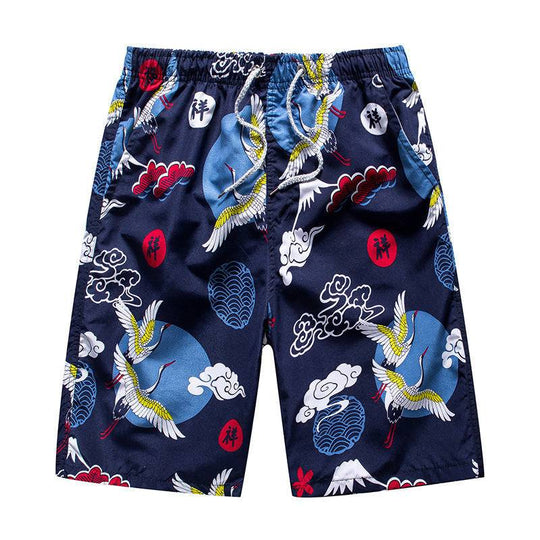 Navy men's beach shorts with crane and cloud prints, inspired by traditional Asian art for a stylish beachwear option.