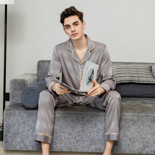 Men's silk pajamas in grey ice silk with long sleeves and trousers, featuring contrast piping, ideal for stylish indoor lounging.