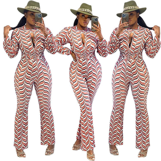 Smocked Print Flared Jumpsuit - Cutout Nipped Waist shown in three mirrored poses, highlighting the bold chevron print and flared legs.
