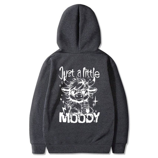 Dark gray American casual hoodie with white 'Just a Little Moody' cartoon cow print, perfect for relaxed fashion looks.