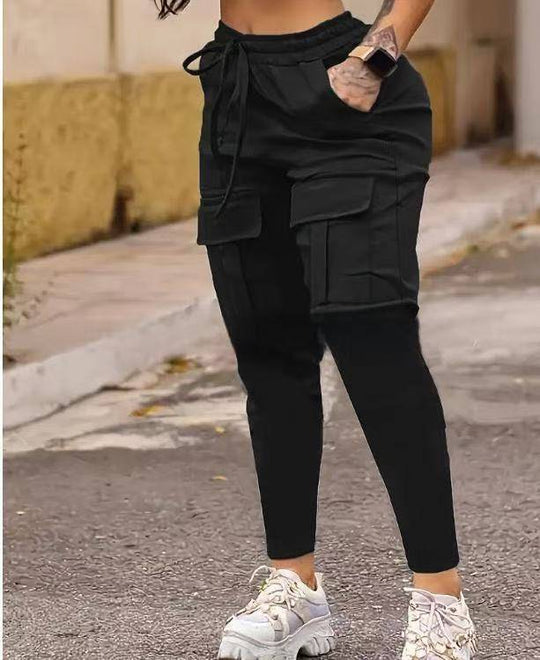 Black European American solid work pants with cargo pockets and elastic waistband, designed for women seeking comfort and utility.