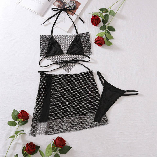 Three-piece black Mesh Crystals Underwear Set for Women laid flat with halter top, mesh skirt, and thong. Made of polyester, sizes S to XL.