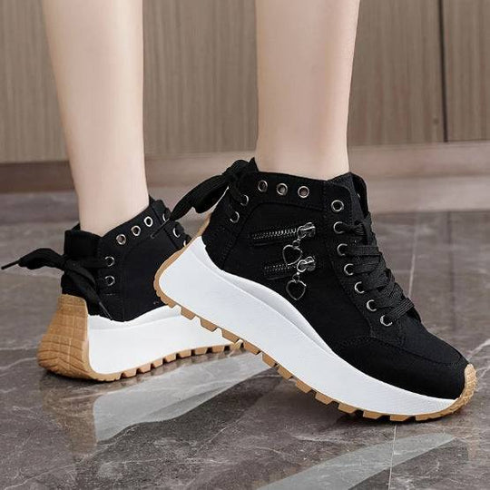 Black high-top casual sneakers for women with platform sole, lace-up front, and rear bow detail, perfect for trendy outfits.