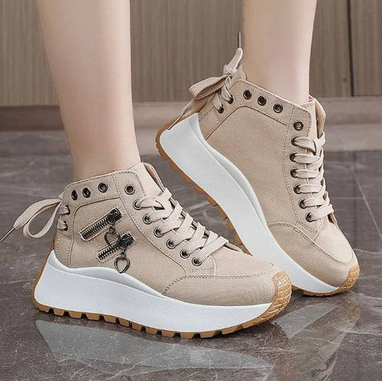 Khaki women's platform fashion sneakers featuring high-top style, round toe, and decorative zippers with heart charms.