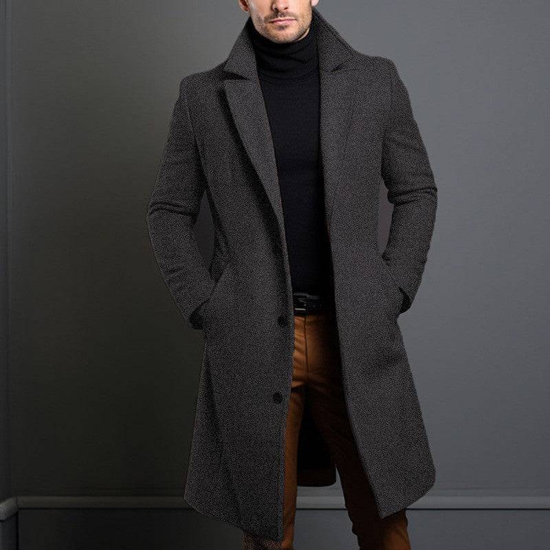 Men's woolen trench coat in dark grey, mid-length design ideal for stylish and warm winter wear. Features a tailored fit with button closure.