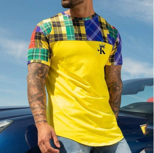 Bold casual round neck t-shirt with yellow body and multicolor plaid digital print on shoulders, short sleeves, and chest logo.