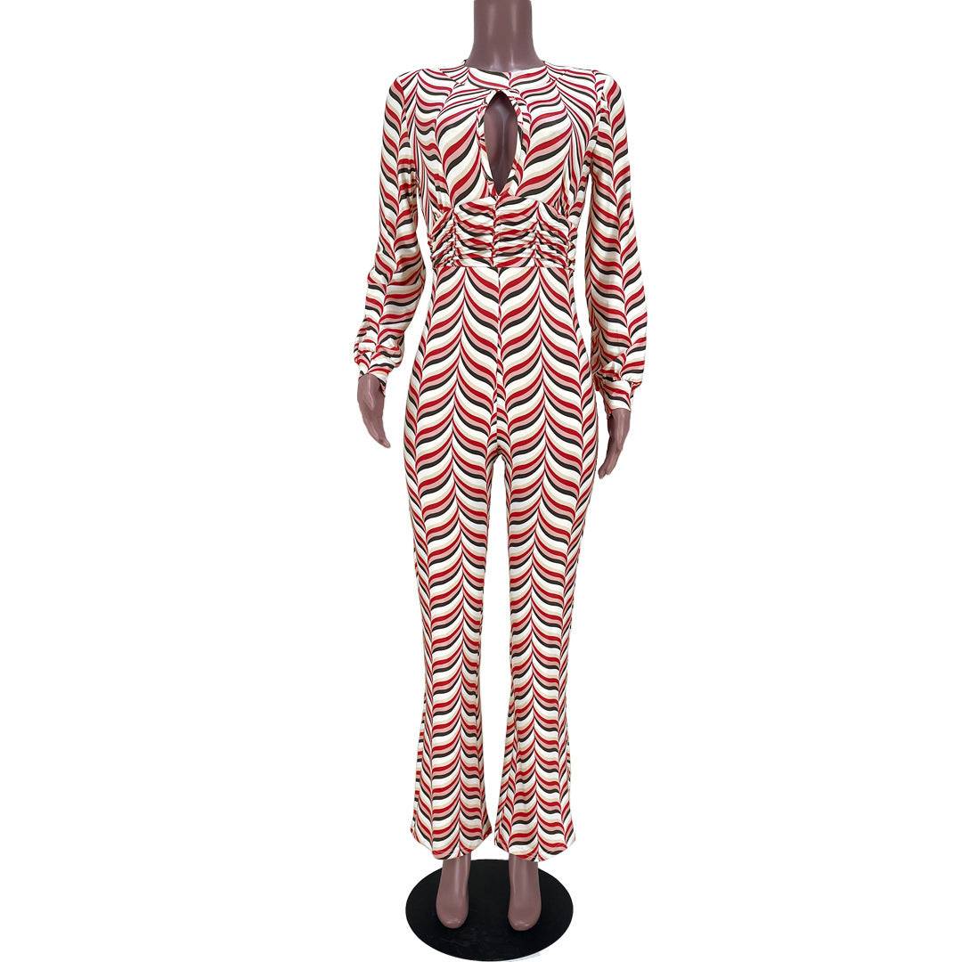Mannequin display of Smocked Print Flared Jumpsuit featuring a cutout nipped waist and long sleeves in red and white geometric pattern.