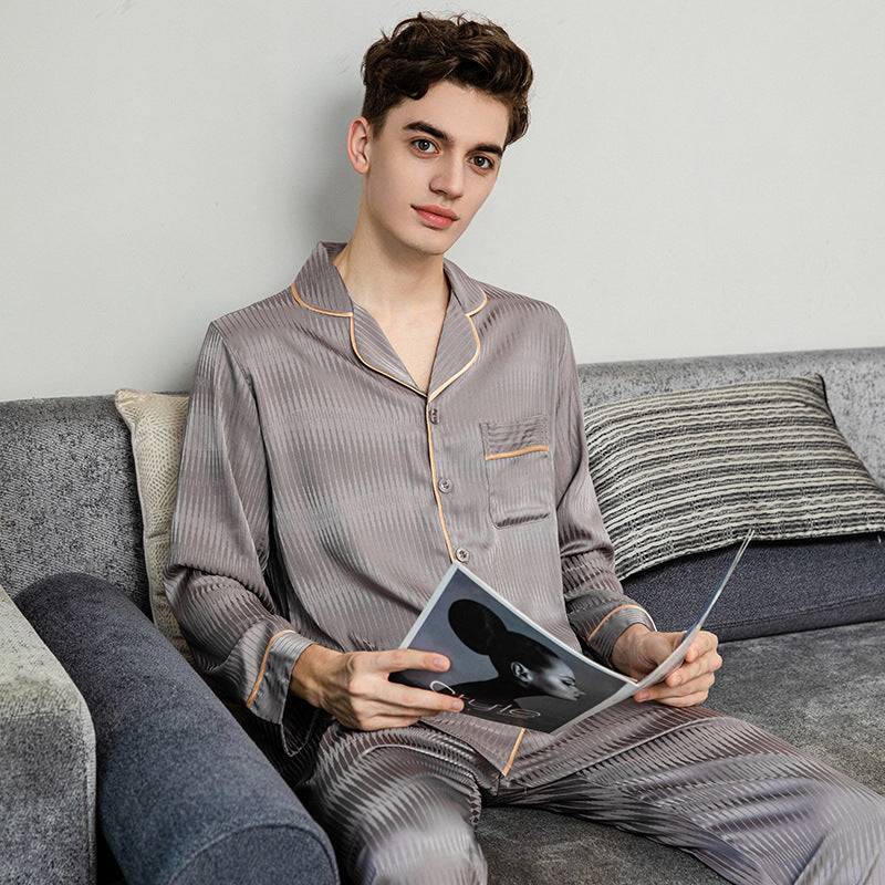 Grey men's ice silk pajamas with a relaxed fit and contrast trim, ideal for comfortable and stylish home lounging or sleepwear.