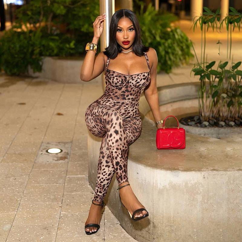 Leopard Print High Waist Jumpsuit - Sexy and Stylish sleeveless jumpsuit with tight fit, paired with black heels and red purse for a bold look.